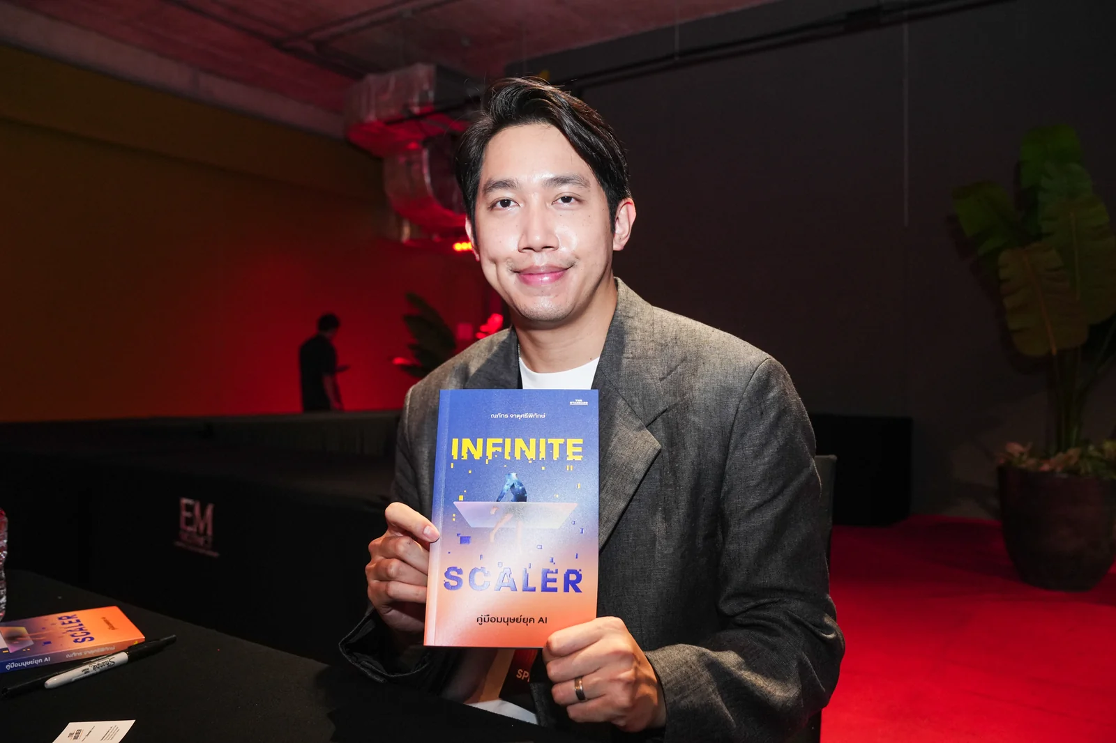 The author holding a copy of Infinite Scaler.