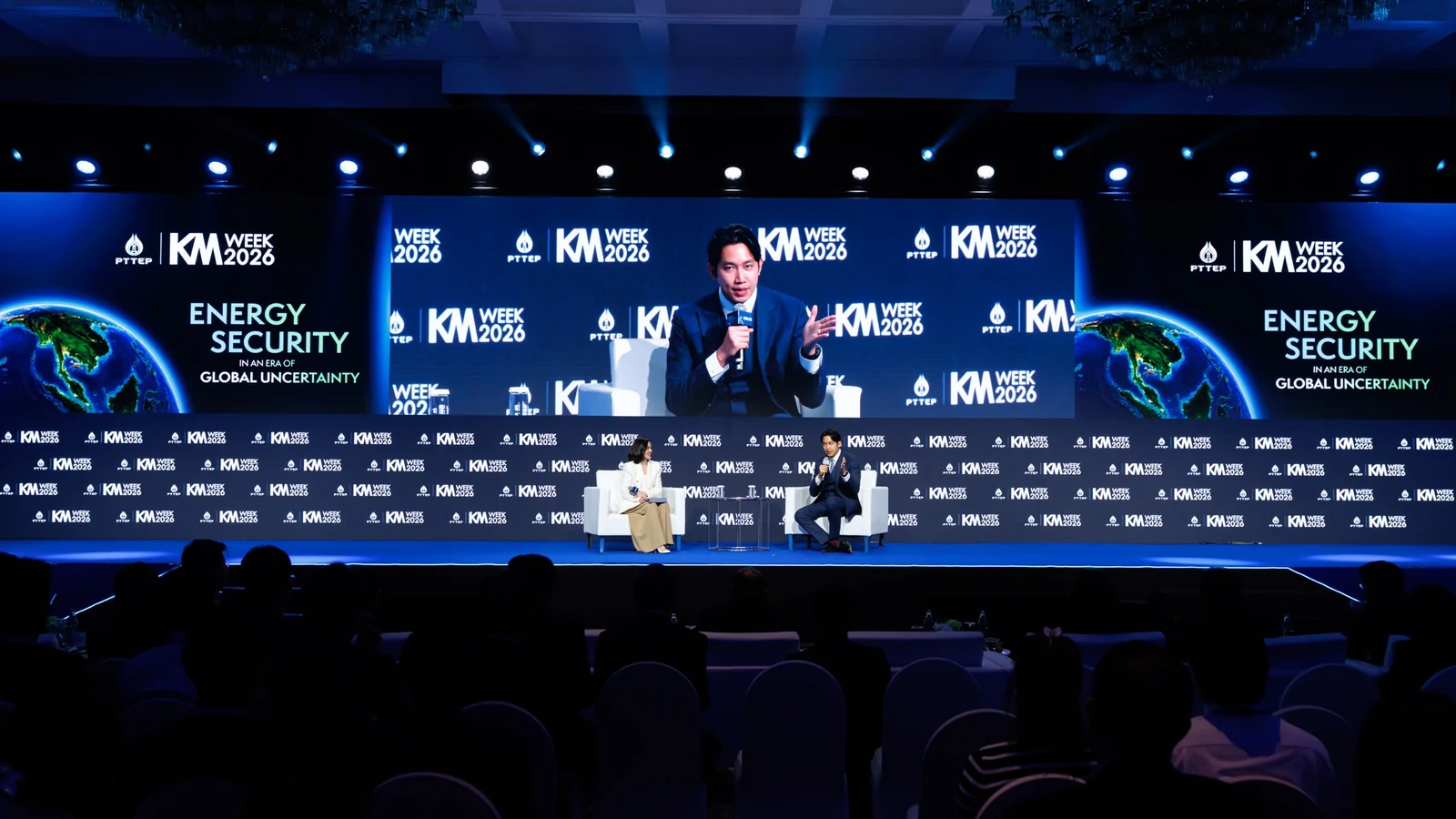 A wide view of the PTTEP KM Week 2026 stage and audience, with the event theme on screen.
